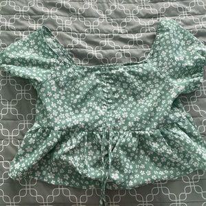 Brand is Romwe, color green with white flowers, and size small.